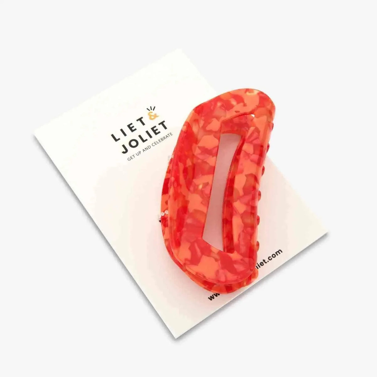 Bold red and orange hair clip for women designed to add vibrant colour and effortless elegance to any hairstyle