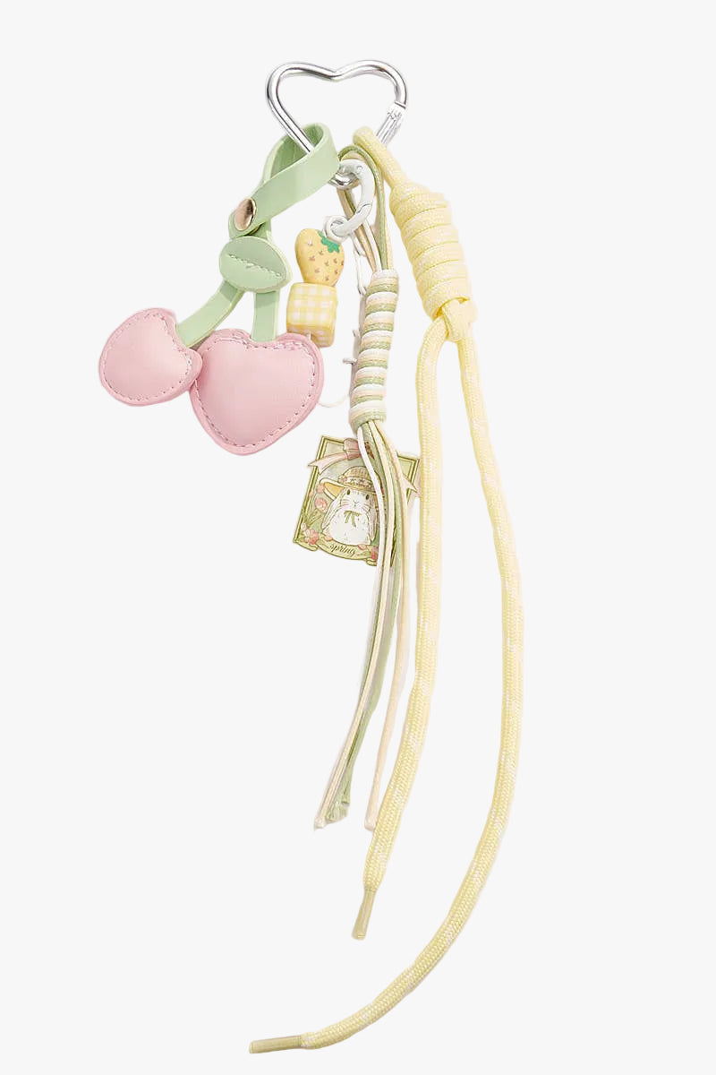 Bright yellow floral bag charm designed to add a playful and elegant accent to handbags and everyday bags