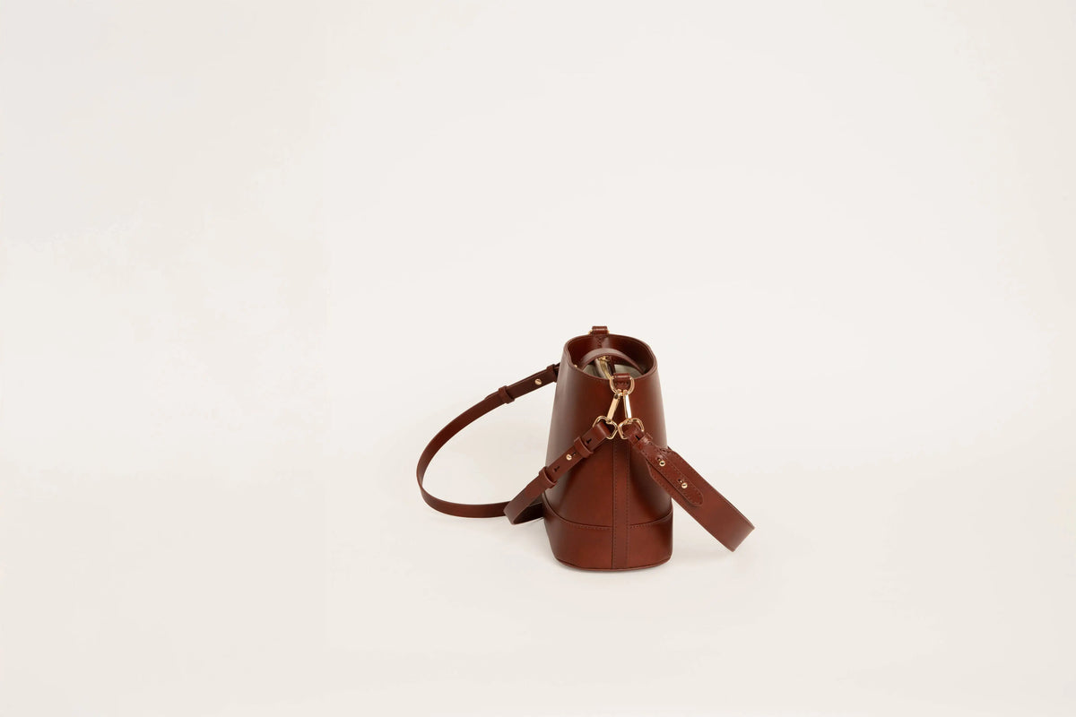 Chic candy pink fashion handbag with an elegant silhouette for modern everyday and evening styling