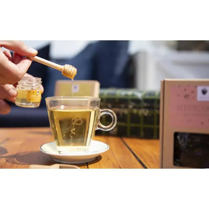 Elegant honey pot with spoon designed for easy honey serving and beautiful kitchen presentation