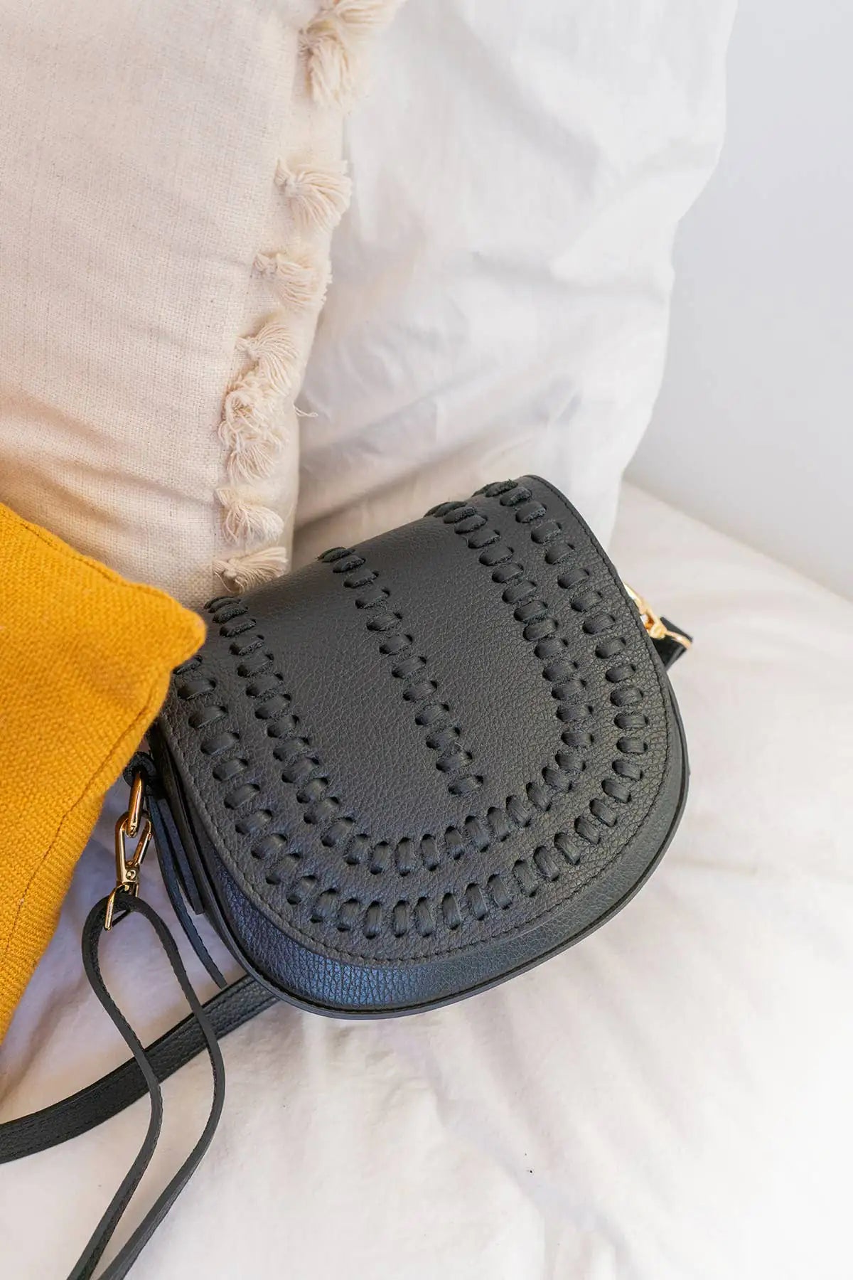 Elegant textured leather shoulder bag with a versatile crossbody design for stylish everyday and occasion wear