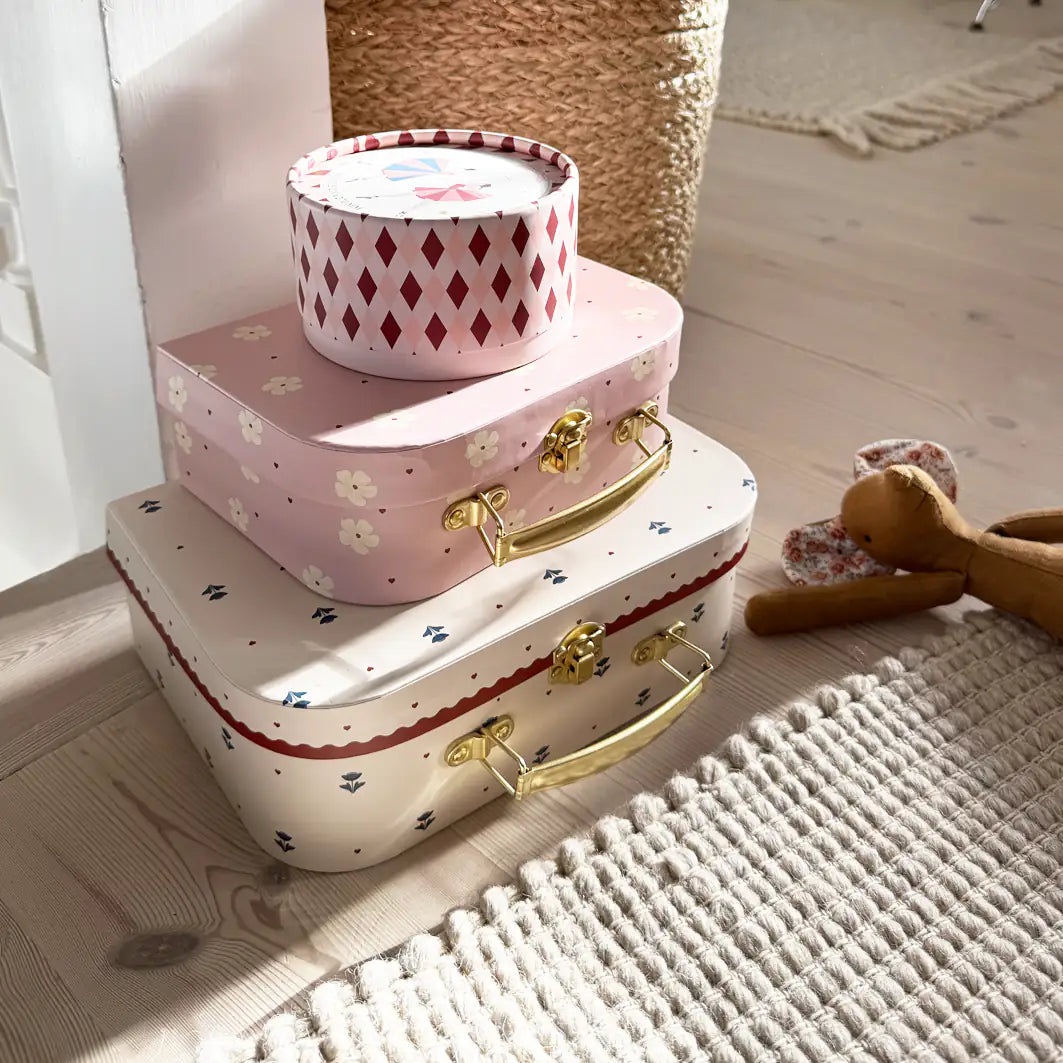 Floral suitcase storage set offering practical organization with a stylish decorative design for home and travel