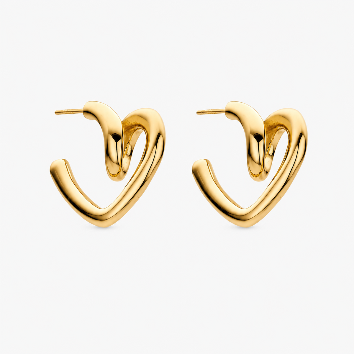 Gold heart earrings with a timeless elegant design and romantic touch for sophisticated jewellery styling