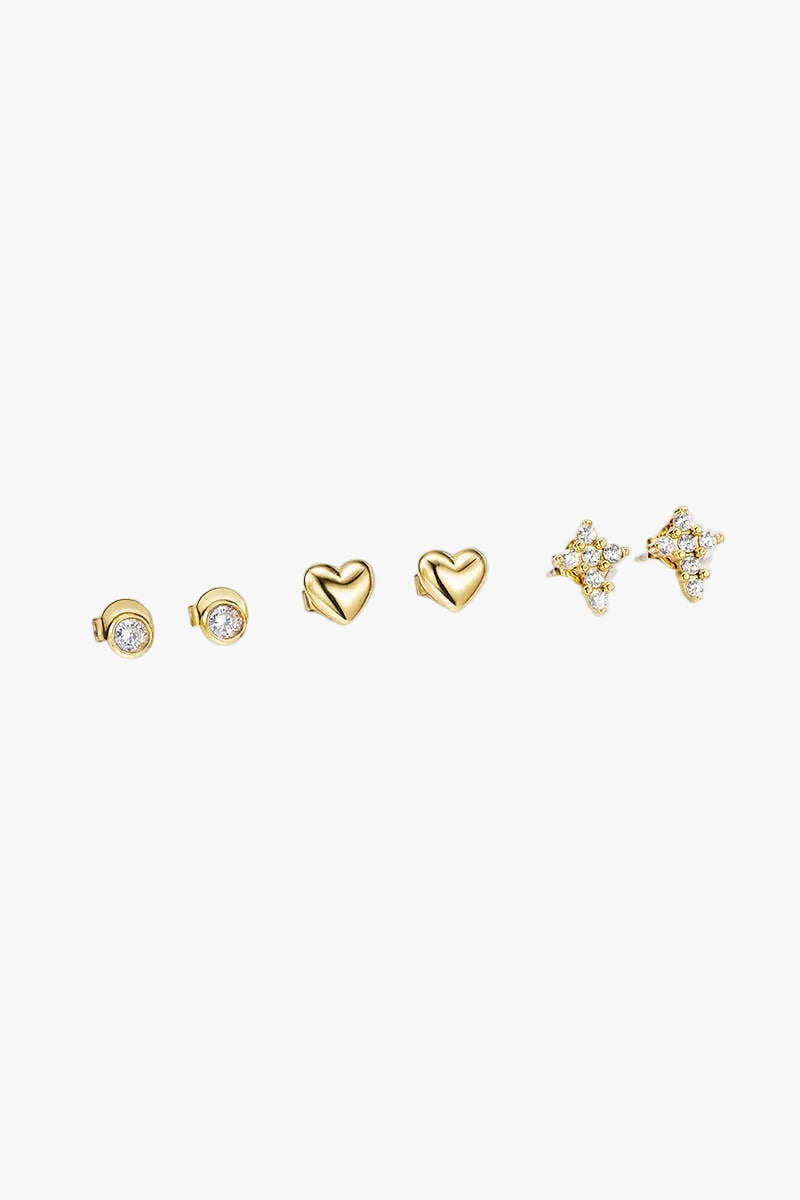 Gold heart stud earrings with an elegant minimalist gold-tone design for everyday wear