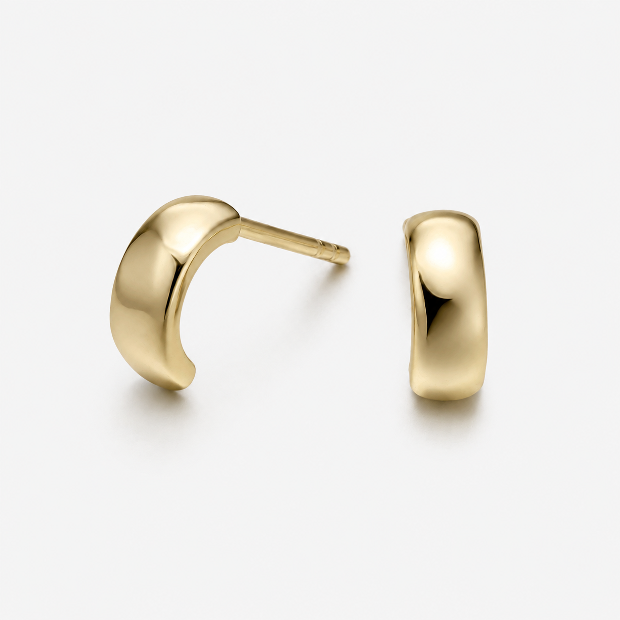 Kiran gold earrings made from 14K gold-plated 925 sterling silver with an elegant everyday statement design
