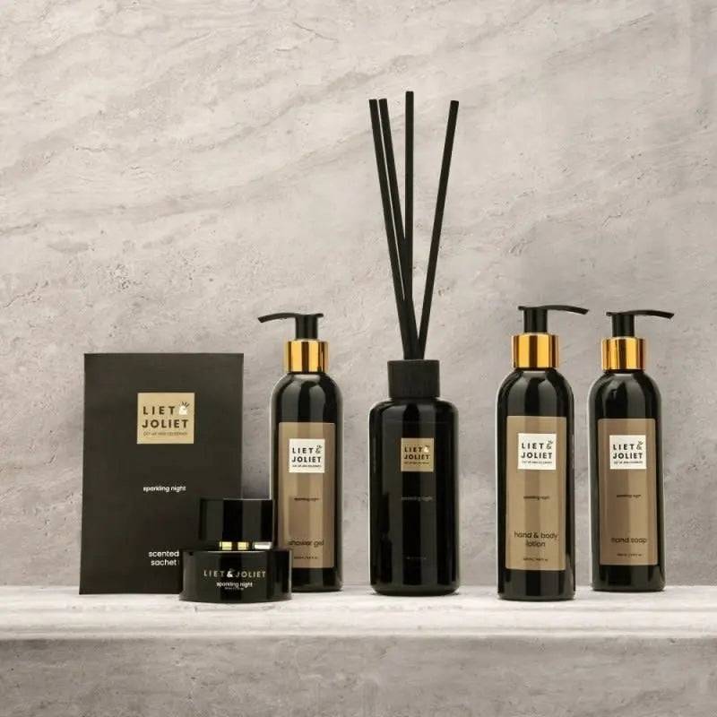 Liet & Joliet Sparkling Night Hand & Body Lotion bottle next to its packaging, 200ml size.