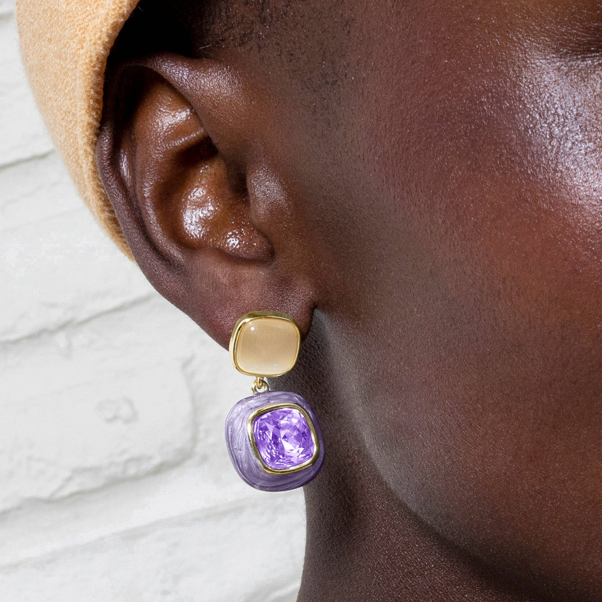 Luxury Xumas statement earrings with amethyst zirconia details and an elegant 18K gold finish