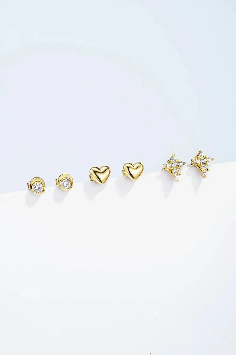 Minimalist gold heart earrings for women with a delicate gold-tone stud design for everyday jewellery