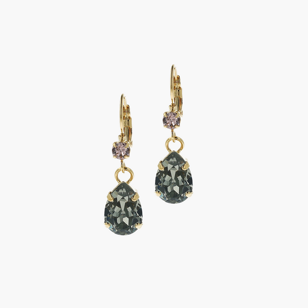 Pair of gold earrings with green teardrop-shaped gemstones on a white background