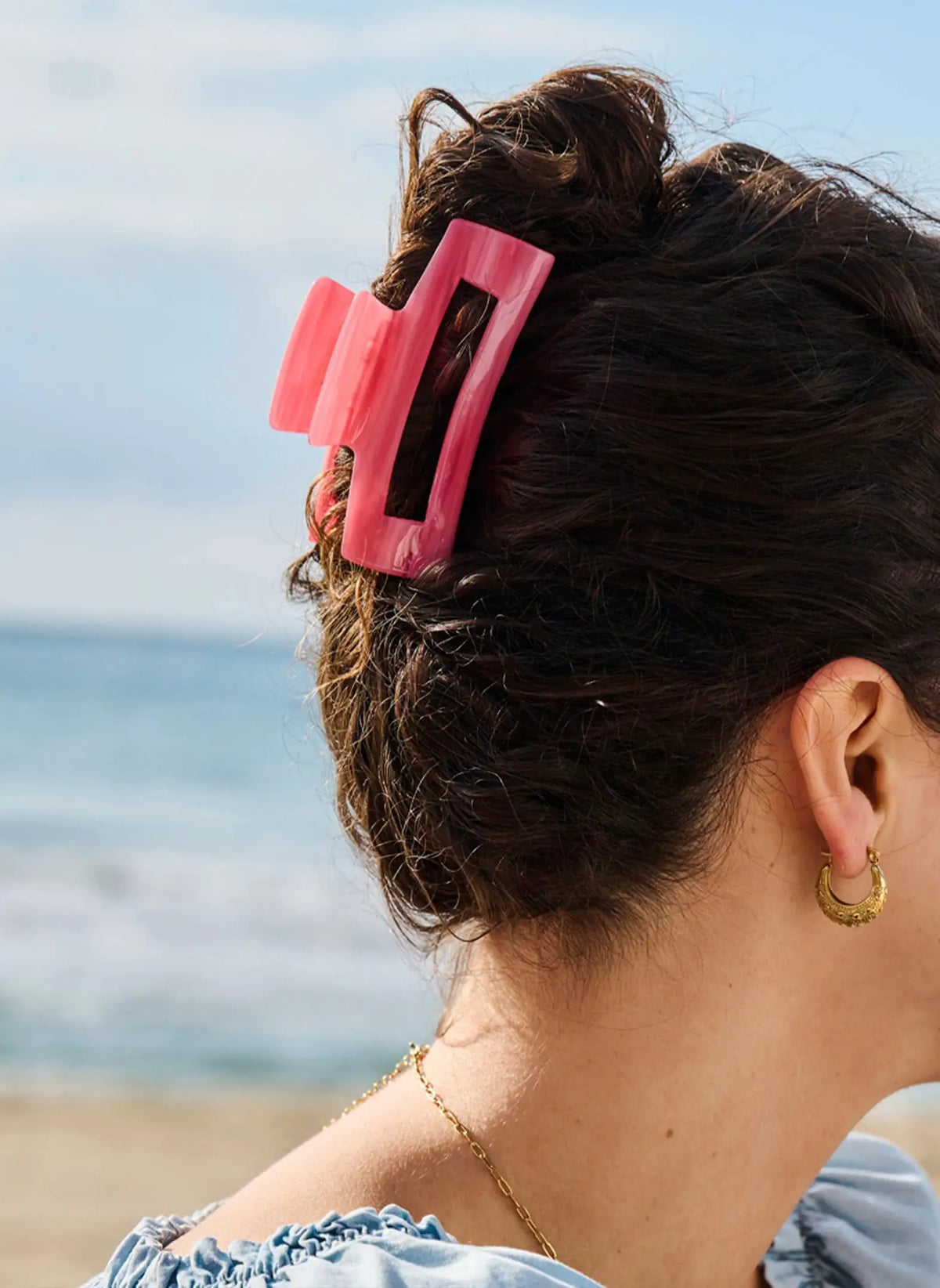 Pink hair clip for women by Emma with a feminine and elegant design for everyday wear