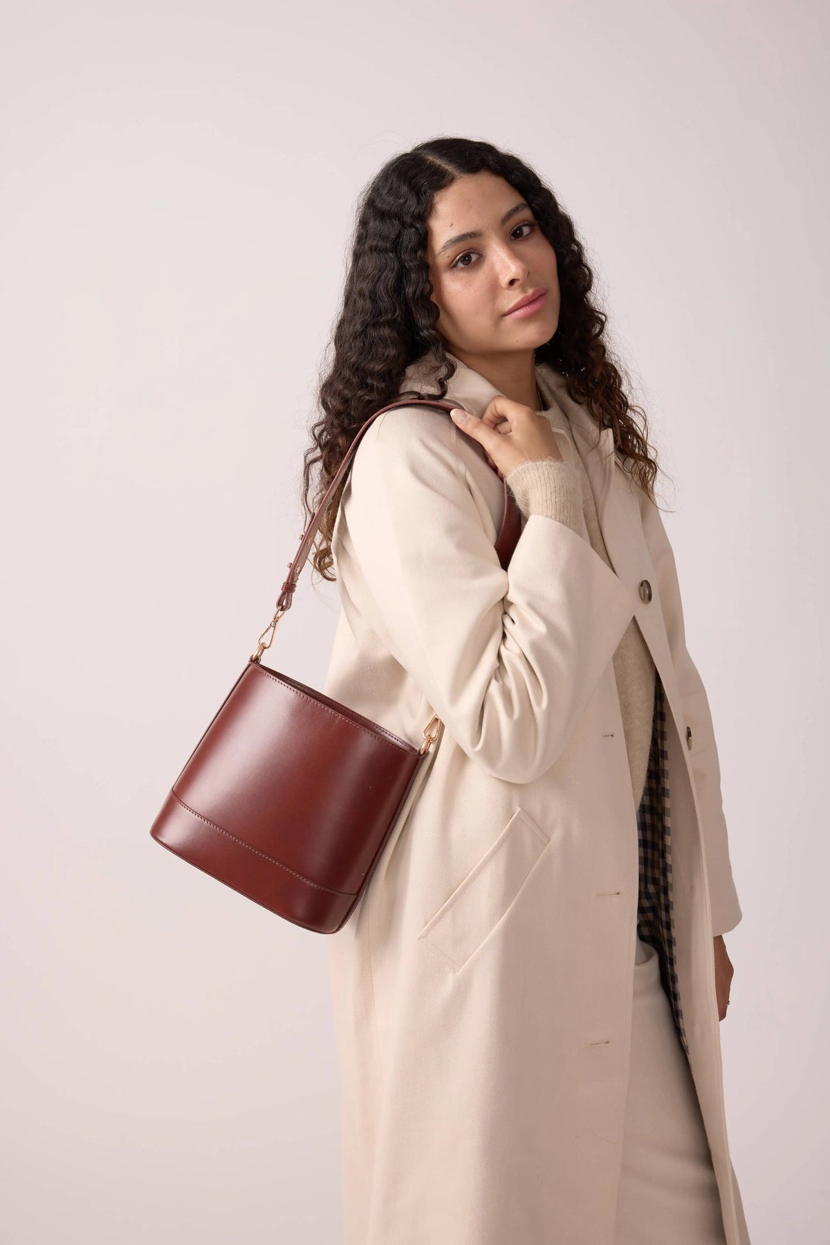 Tessa elegant pink statement bag featuring a vibrant candy pink finish and stylish contemporary design