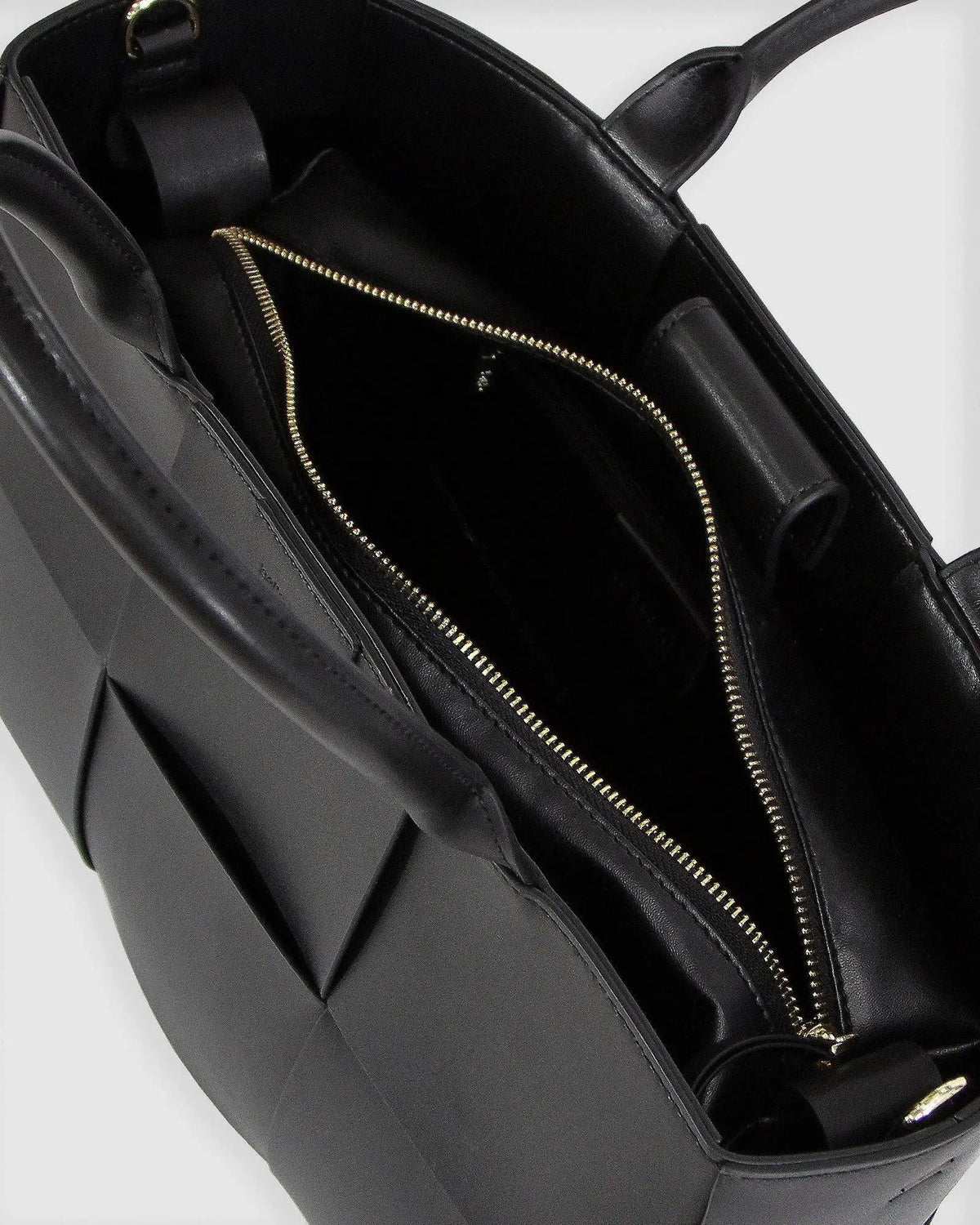 Woven leather everyday tote designed for carrying daily essentials with effortless elegance