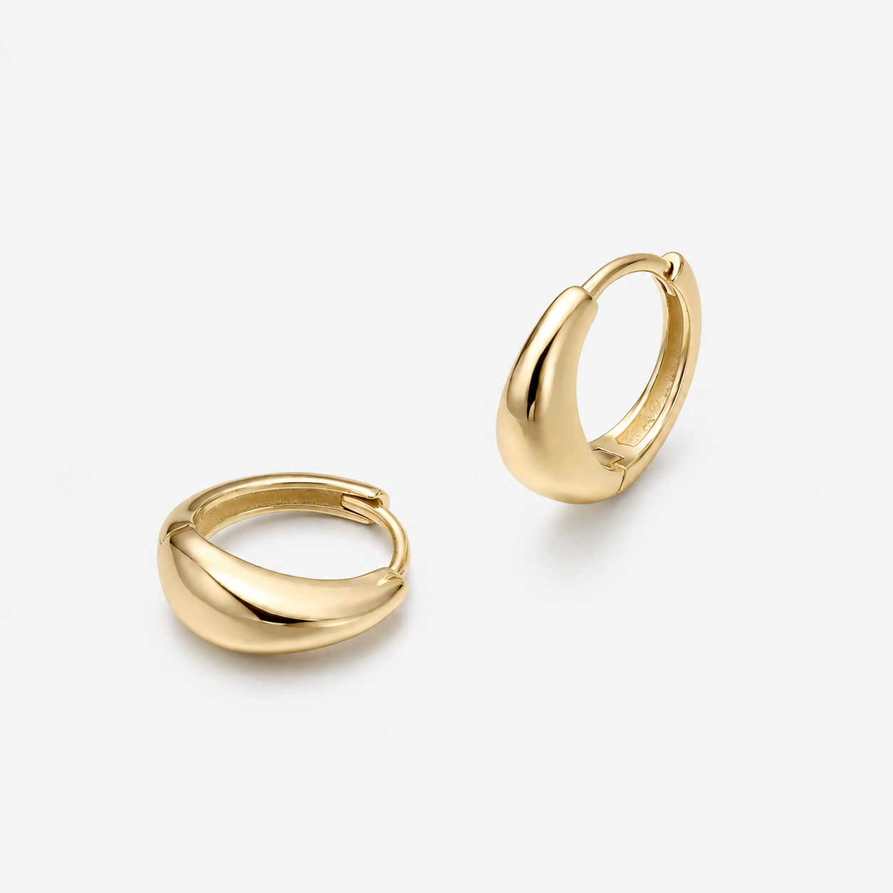 Yulia gold hoop earrings crafted from 14K gold-plated 925 sterling silver with an elegant everyday statement design
