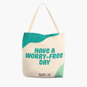 Naïf shopper tote bag with "Have a Worry-Free Day" text, free with €35 Naïf purchase.