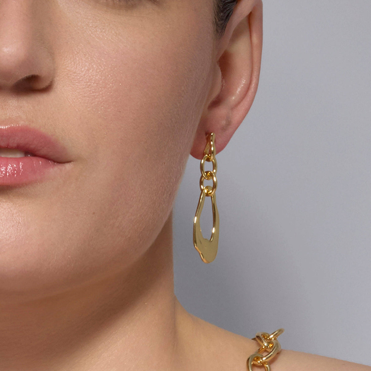 18K gold-plated contemporary statement earrings by Luxenter Othoai with an elegant and refined design
