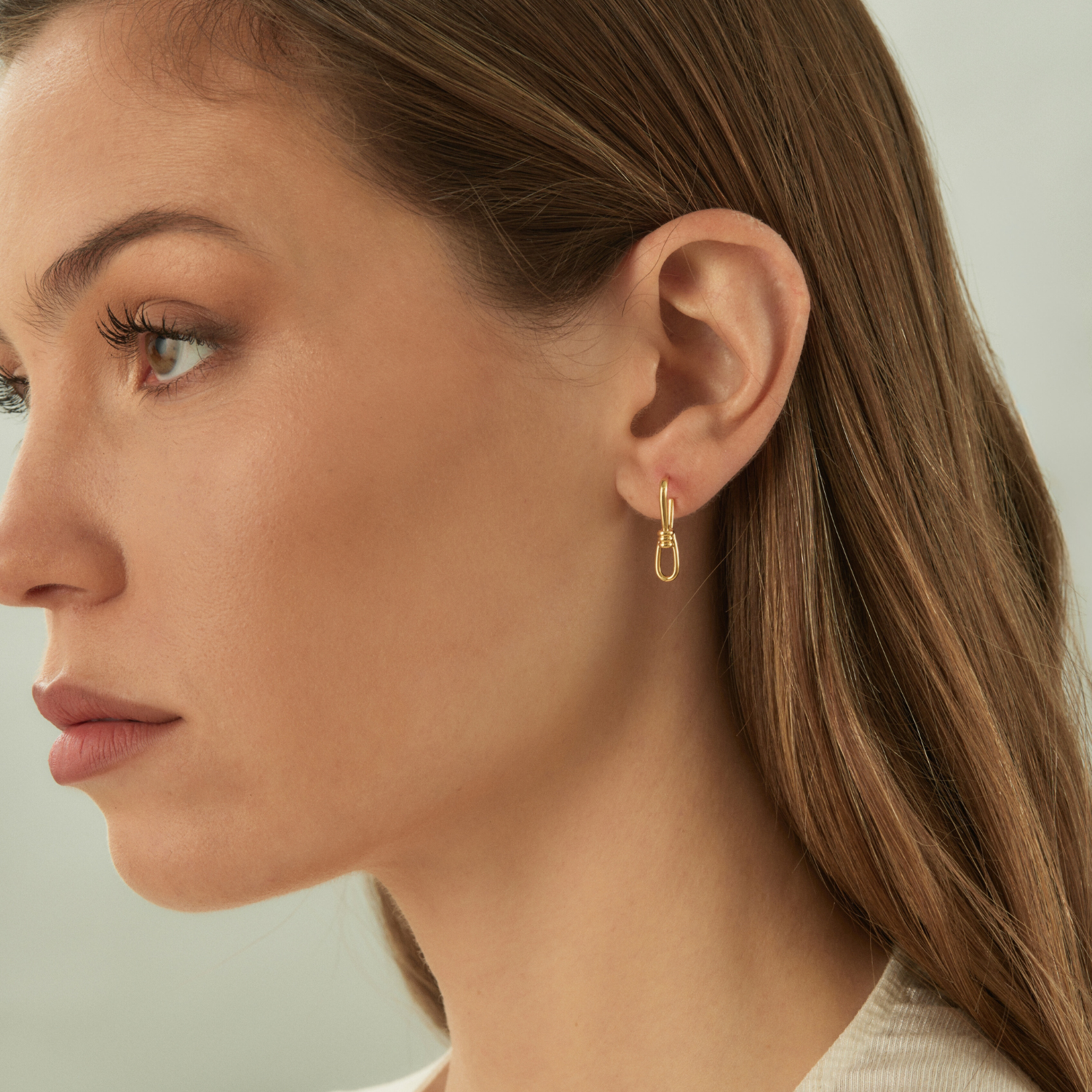 18K gold-plated minimalist earrings crafted from 925 sterling silver with a timeless knot design