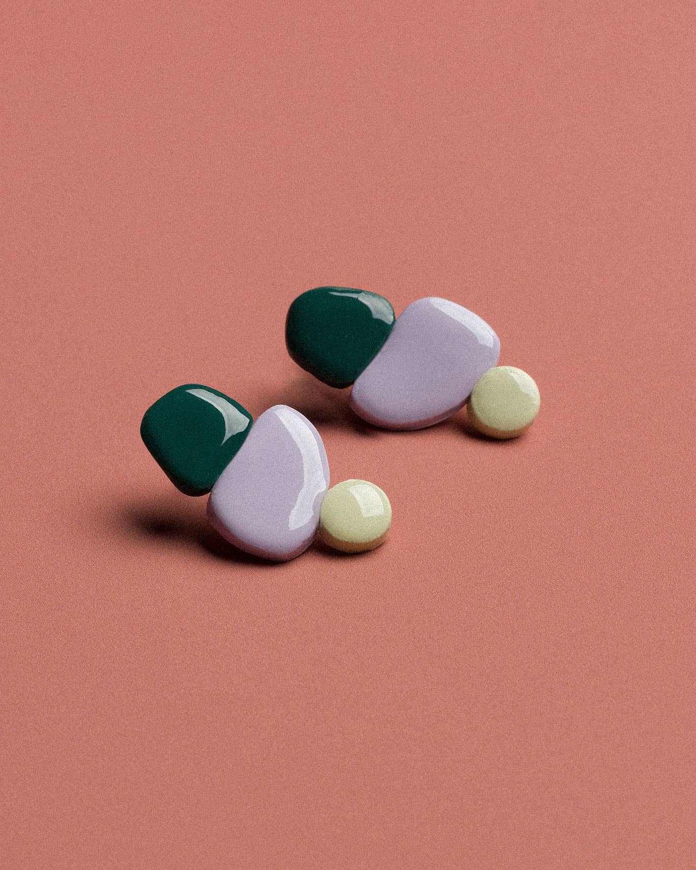 Candy green and blue handmade earrings featuring a distinctive polymer clay design and lightweight construction