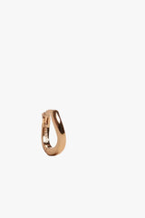 Elegance Charm hoop earrings with an elegant gold-tone finish and refined charm detail