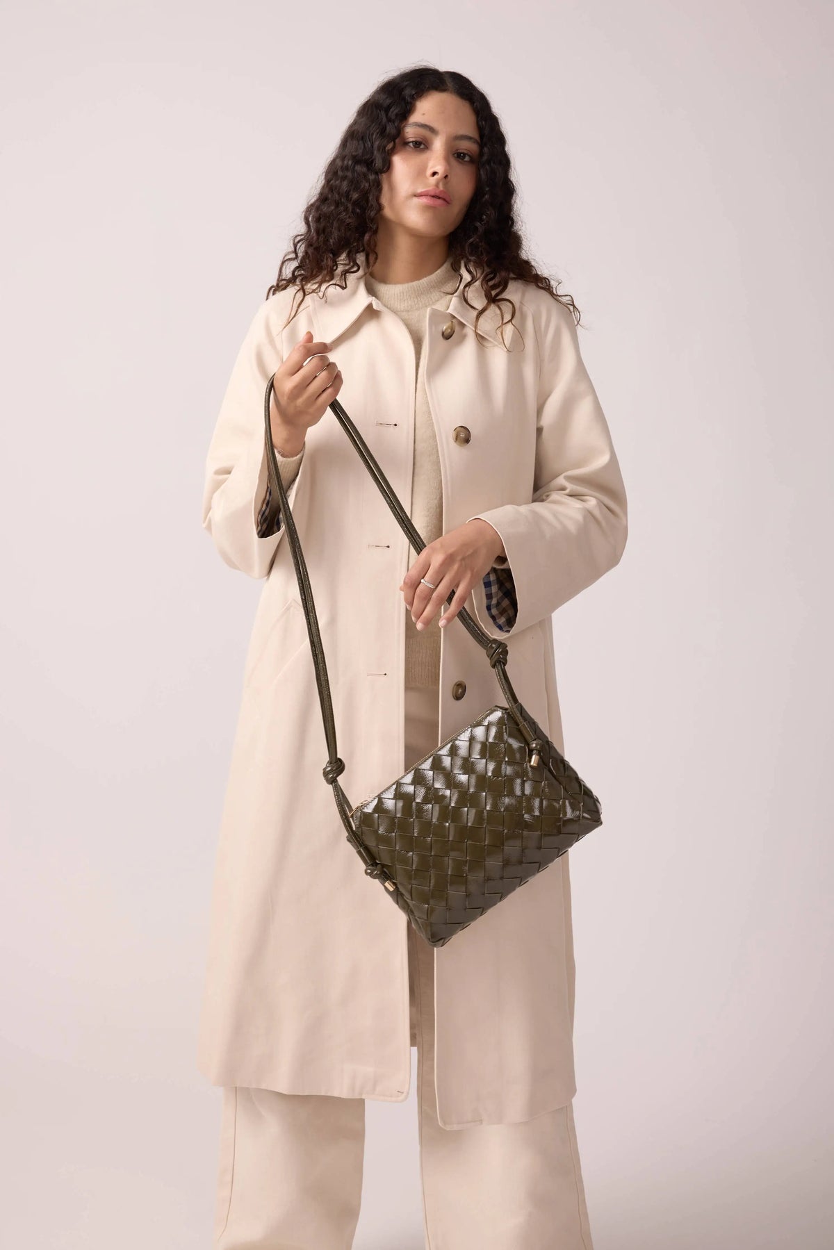 Georgia woven bag with an elegant silhouette and textured finish for versatile everyday use