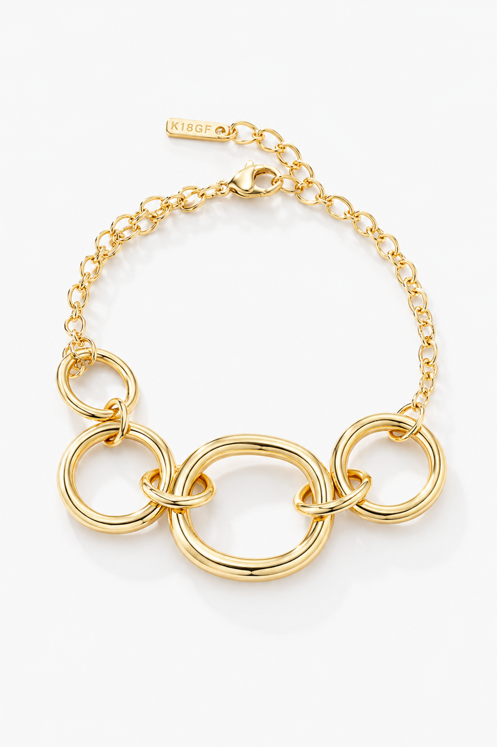 Gold chain bracelet with interlocking rings on a white background