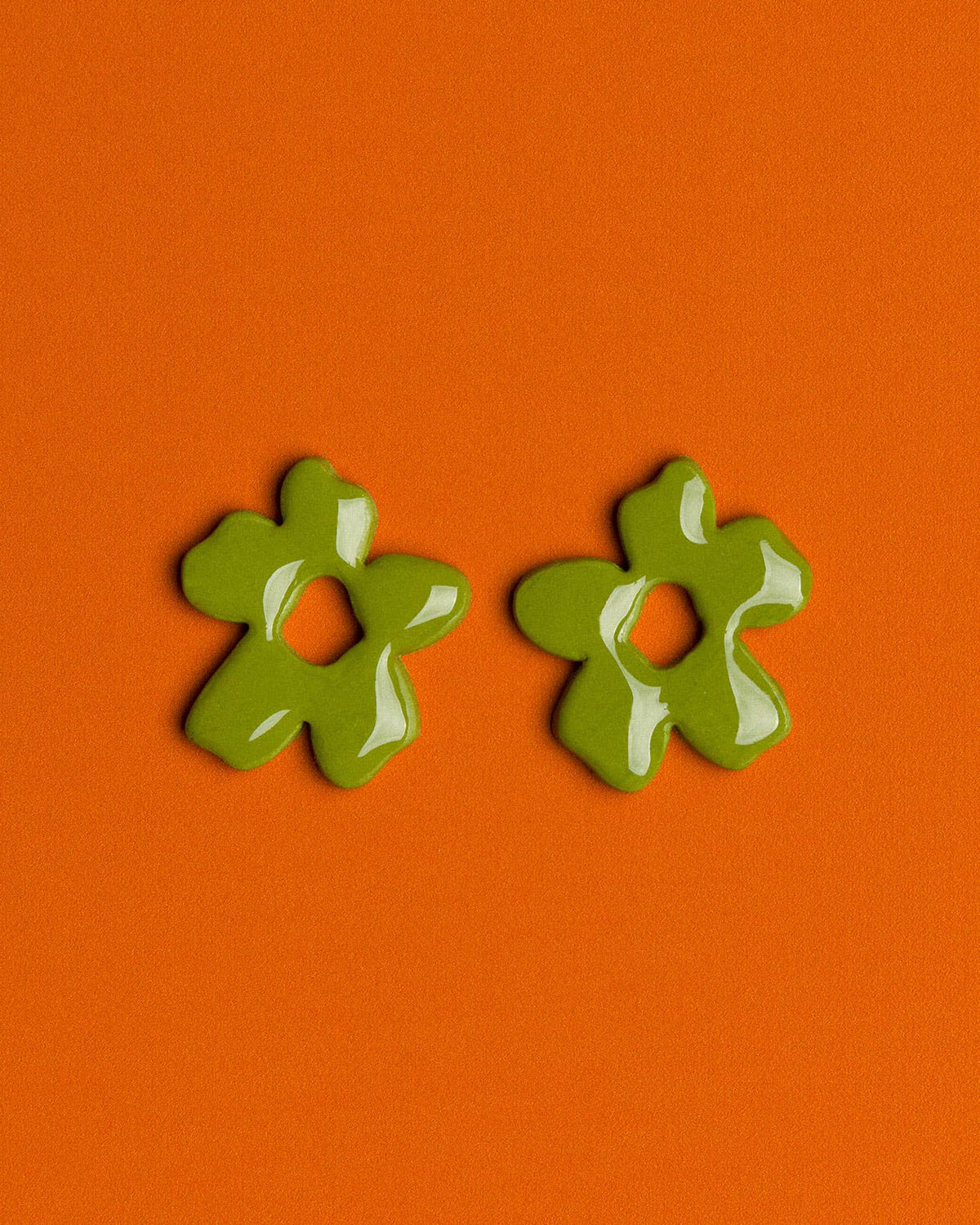 Handmade olive green polymer clay earrings with a lightweight floral-inspired design for everyday styling
