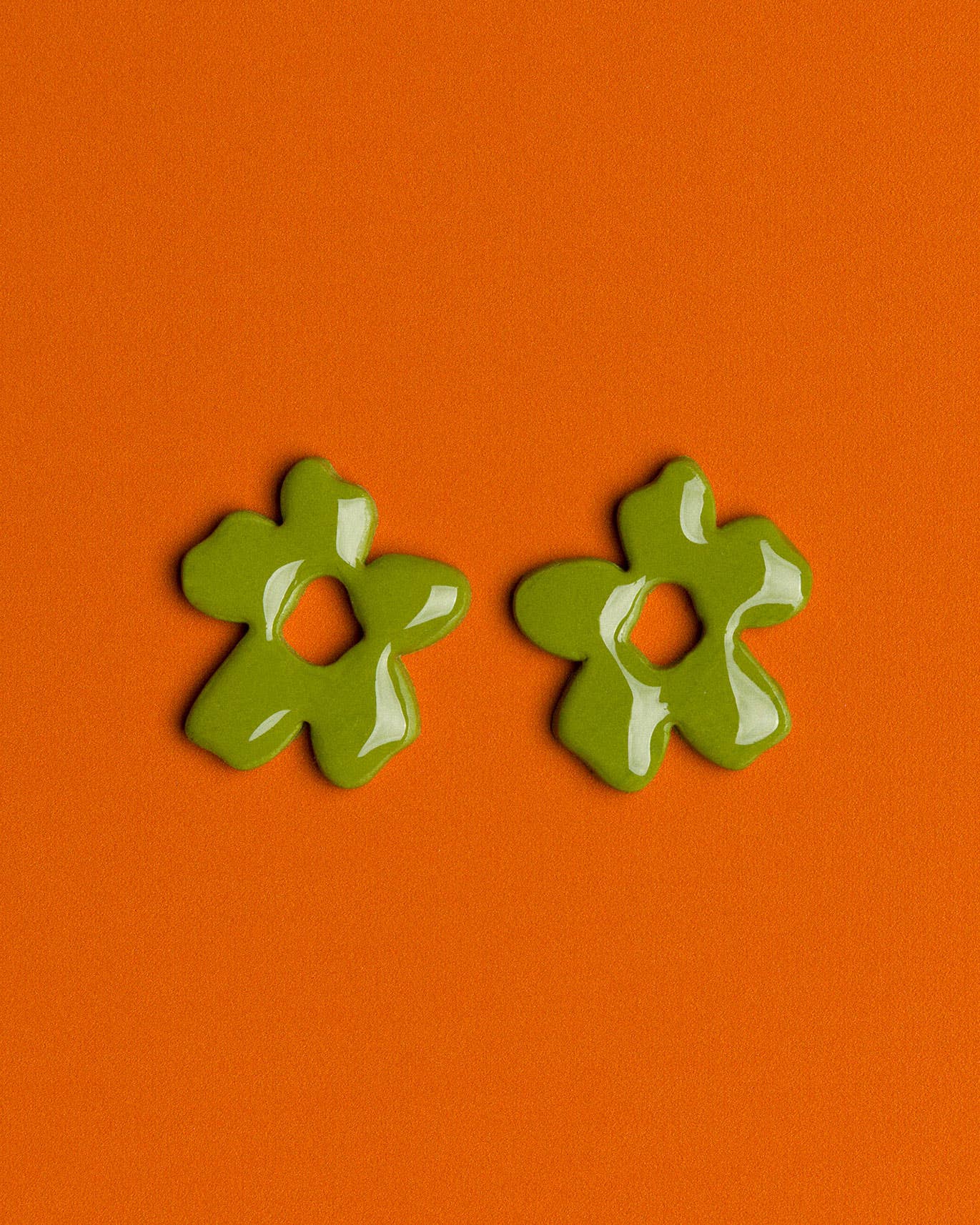 Handmade olive green polymer clay earrings with a lightweight floral-inspired design for everyday styling