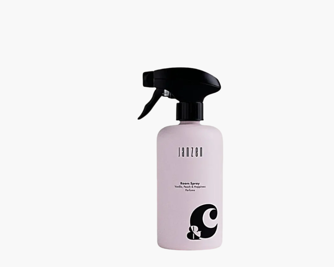 Janzen RoomSpray Vanilla, Peach & Happiness bottle with spray trigger.
