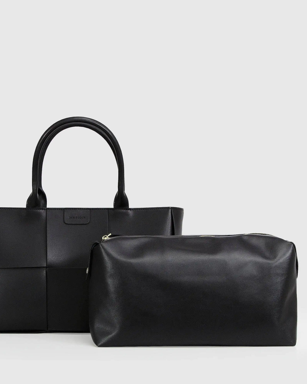  Luxury woven leather tote bag with a sophisticated textured finish and timeless everyday style