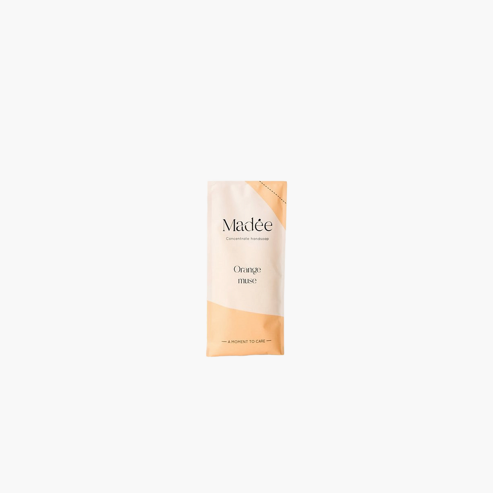 Skincare product packaging with 'Madée' branding on a white background