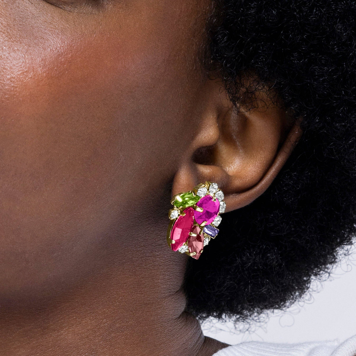 Mutaj red and pink floral earrings with a distinctive botanical design for an elegant statement jewellery look
