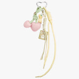 Pastel-colored hair tie with heart-shaped ends on a white background