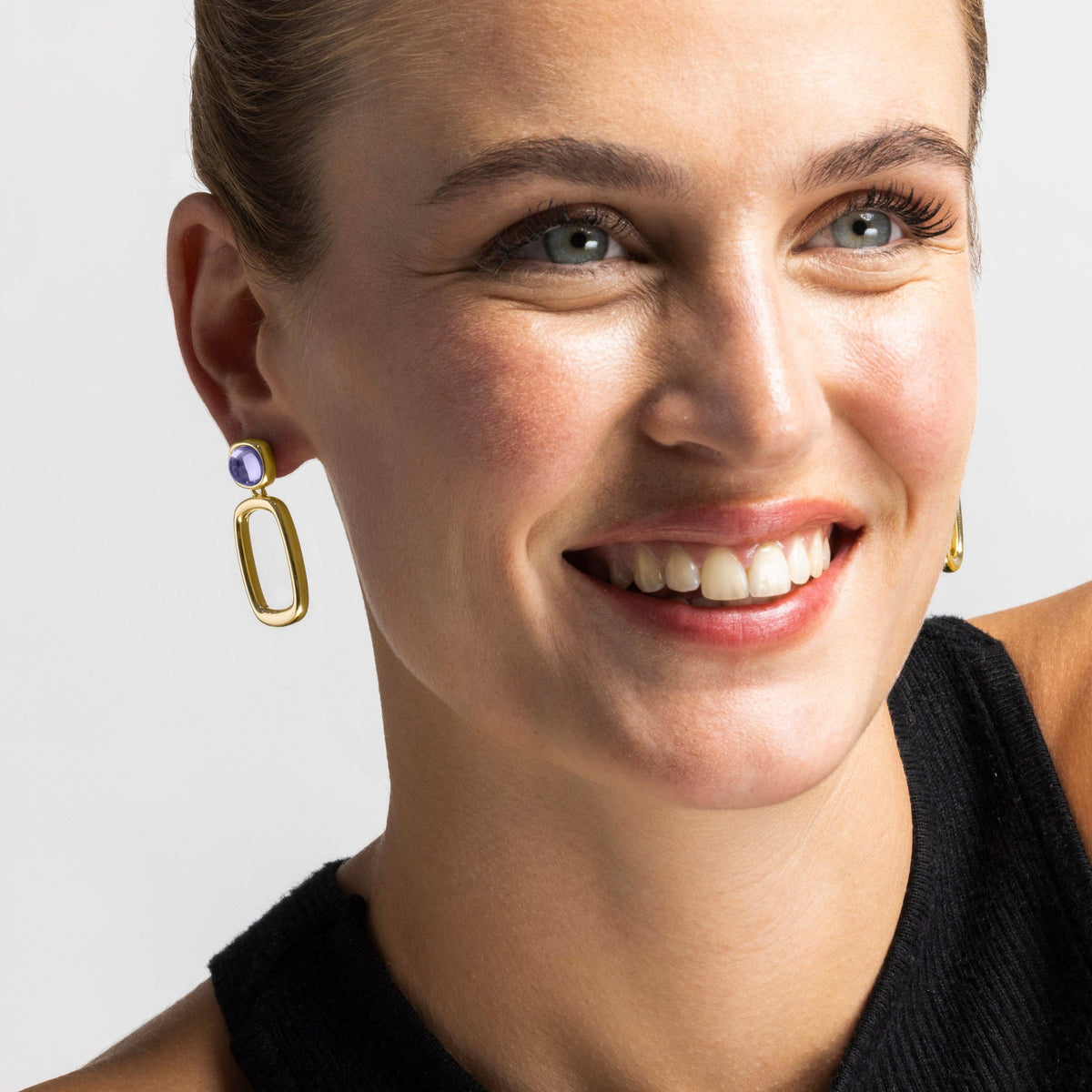 Purple crystal earrings featuring an elegant 18K gold finish for everyday and evening jewellery styling