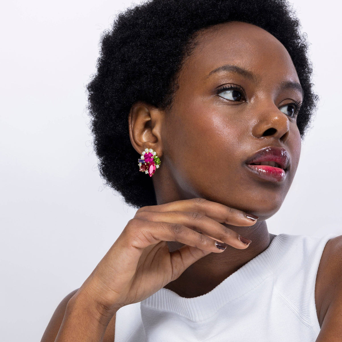 Red and pink botanical statement earrings by Mutaj featuring a colorful floral-inspired design