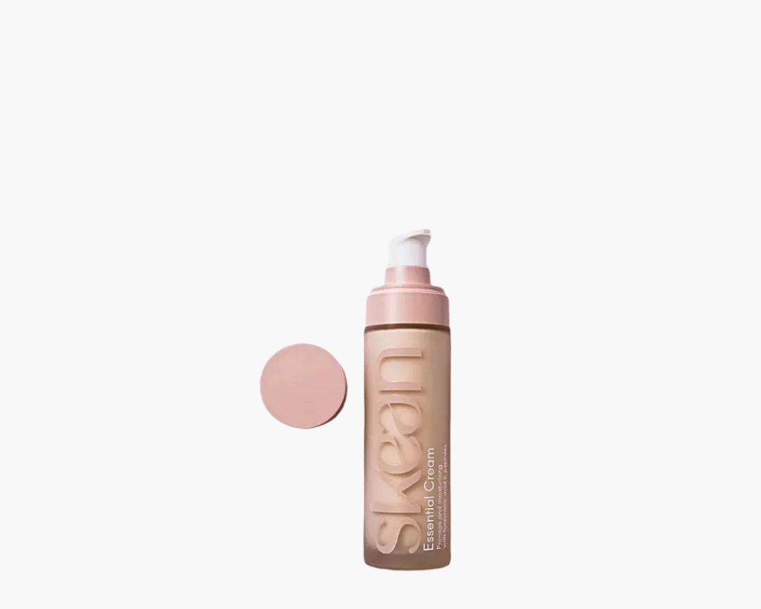 SkeanBeauty Essential Cream bottle with pump dispenser and pink cap.