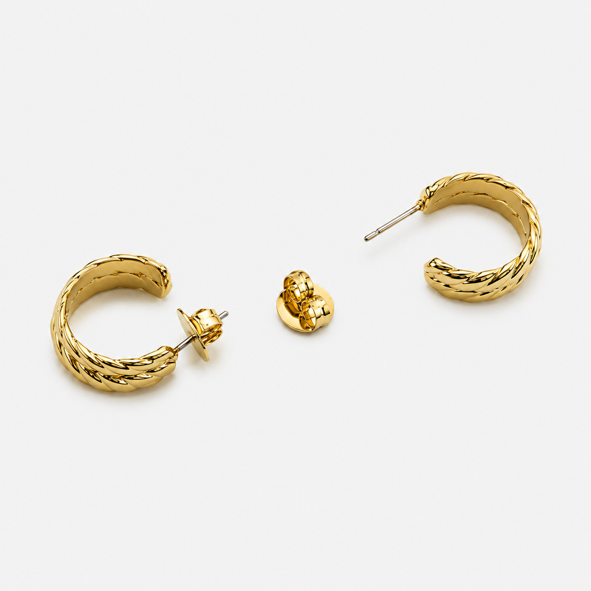 Thety timeless gold earrings with a sophisticated 18K gold finish and understated elegant silhouette