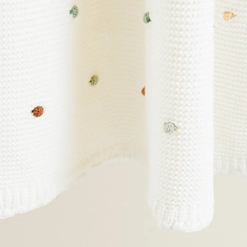 Annie & Charles DOTS Blanket made of cotton, 100x70 cm, features colorful dots.