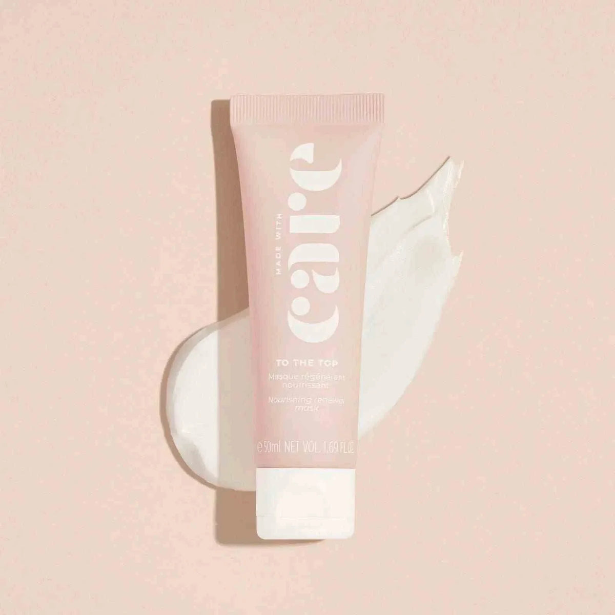 Made With Care - Nourishing Mask tube in soft pink with white text and creamy white mask swatch beside it