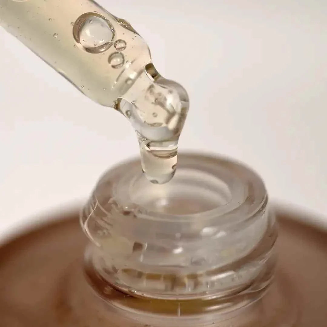 SkeanBeauty Essential Serum Travel clear lightweight liquid serum with dropper dispensing hydration and radiance